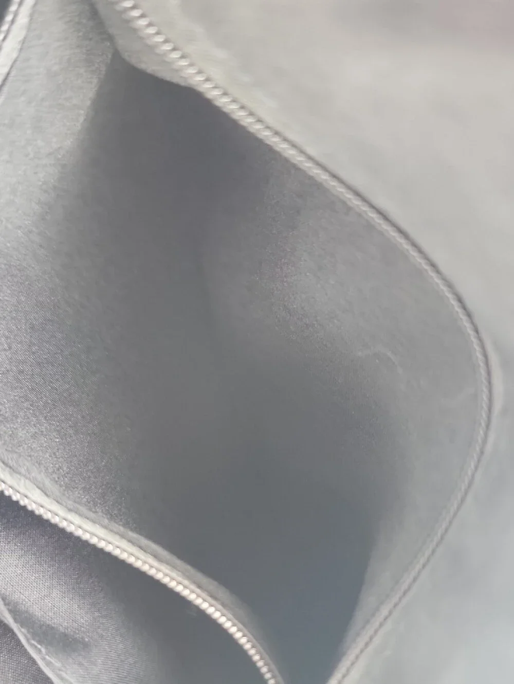 Kenneth Cole Reaction sleek patent